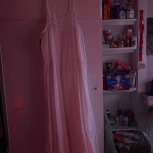 here is a cute plain white summer dress size medium and never worn